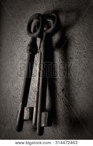 Old Rusted Keys Hanging On The Wall