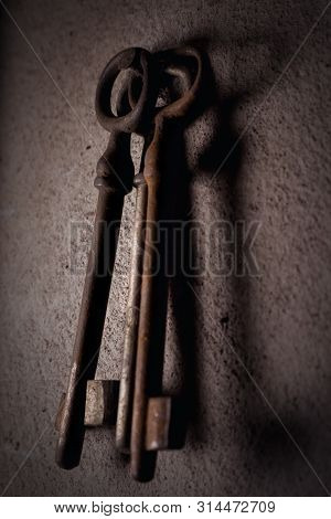Old Rusted Keys Hanging On The Wall