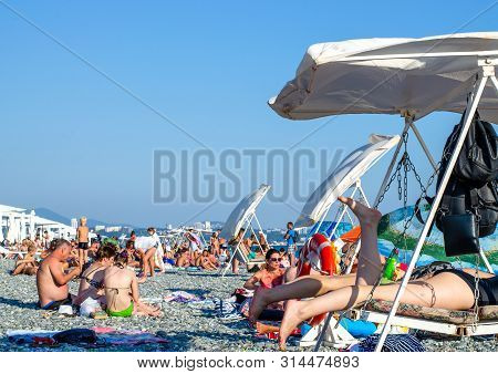 Sochi, Russia - July 7, 2019: Rest On The Beach Of Dagomys