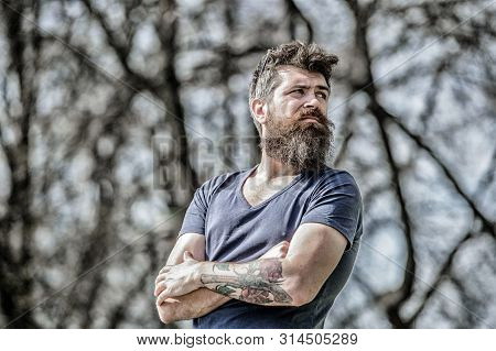 Man Attractive Bearded Hipster Posing Outdoors. Confident Posture Of Handsome Man. Guy Masculine App