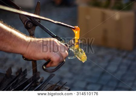Making Figurines From Glass, Just Pulled Out Of The Oven