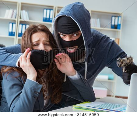 Criminal taking businesswoman as hostage in office