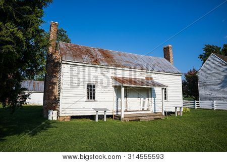 Surry, Virginia/usa - July 20, 2019: The Last Remaining 1830s Era Slave Cabin At Bacons Castle, The 