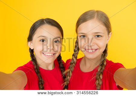 Real Heppiness. Selfie Girls. Small Girls Make Selfie On Phone. Having Fun. Sisterhood And Friendshi