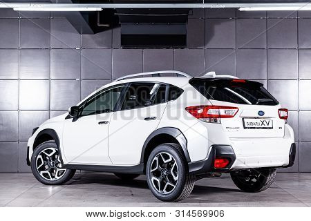 Novosibirsk, Russia - June 30, 2019: White Subaru Impreza Xv,  Back View.  Photography Of A Modern C