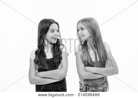 Having A Cute Easygoing Look. Natural Hair Styling And Dressing. Cute Little Girls Wearing New Hairs
