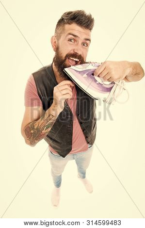 Ironing Out. Bearded Man Smoothing Beard Hair With Iron. Providing Household Services. Hipster With 
