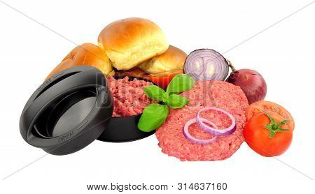 Freshly Made Raw Beefburgers With Brioche Bread Buns, Onions, Tomatoes And Burger Press Isolated On 