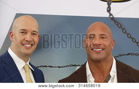 Dwayne Johnson and Hiram Garcia at the World premiere of 'Fast & Furious Presents: Hobbs & Shaw' held at the Dolby Theatre in Hollywood, USA on July 13, 2019.