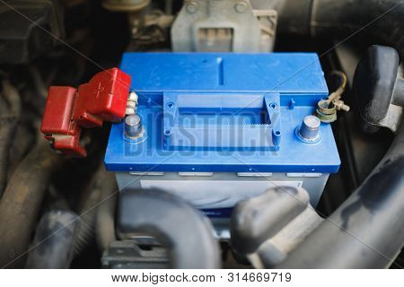 new lead-acid automotive electric battery replacement in old car