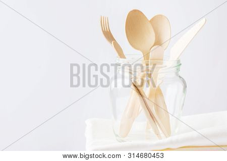 Wood Cutlery Spoons Fork Knife In Glass Jar On Folded Cotton Food Bag Sack. Zero Waste Plastic Free 