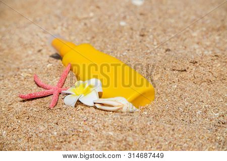 Sunblock On The Beach. Sun Protection. Selective Focus.