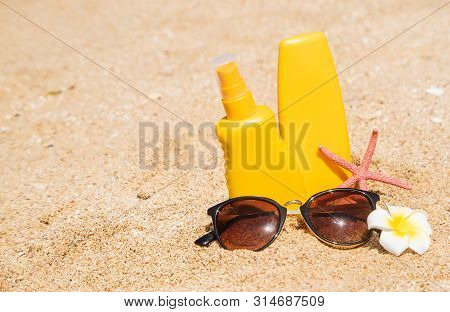 Sunblock On The Beach. Sun Protection. Selective Focus.