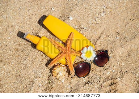 Sunblock On The Beach. Sun Protection. Selective Focus.