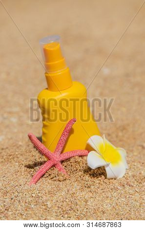 Sunblock On The Beach. Sun Protection. Selective Focus.