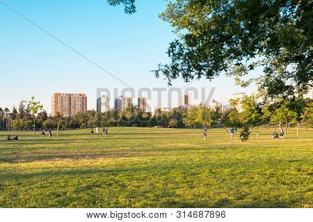 Santiago, Region Metropolitana, Chile - November 19, 2018: People Enjoying A Summer Evening In Parqu