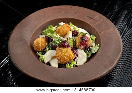 Tasty Homemade Cheese Donuts Jam, Poured With Pear And Salad.