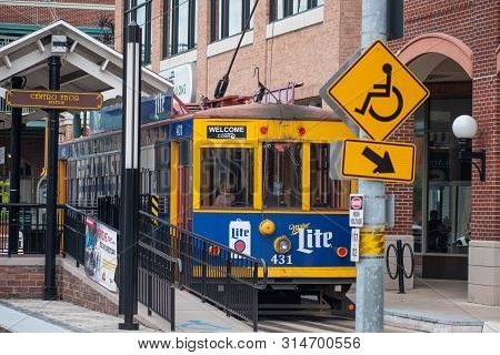 Ybor City Tampa Bay, Florida. July 12 , 2019  Centro Ybor Complex And Colorful Streetcar.  Ybor City