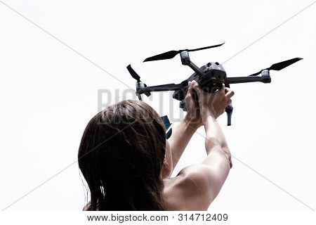 Female Hand Launches Drone For Flight, With Which You Can Take Photos And Video Filming, Close-up.