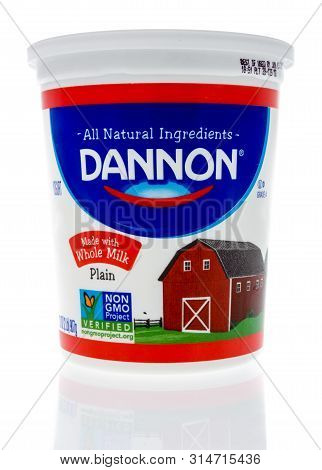 Winneconne, Wi - 19 May 2019 : A Package Of Dannon Whole Milk Yogurt On An Isolated Background
