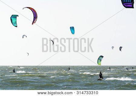 Water Sport Event, Kite Surfers Race In North Sea Near Renesse, Zeeland, Netherlands
