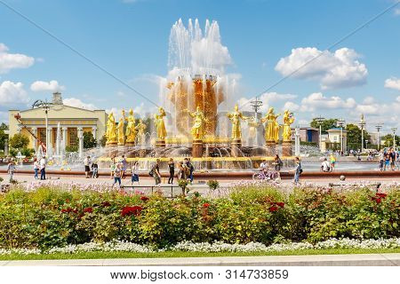 Moscow, Russia - July 22, 2019: View Of Friendship Of Peoples Fountain In Vdnh Park In Moscow On A B