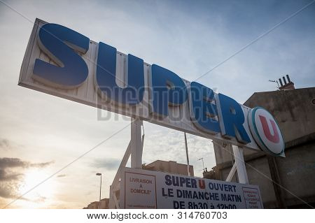 Lyon, France - July 18, 2019: Super U Logo In Front Of Their Local Supermarket In Lyon. Super U Is A