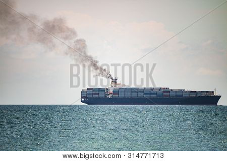 Container Ships In The Sea Have A Lot Of Black Smoke.