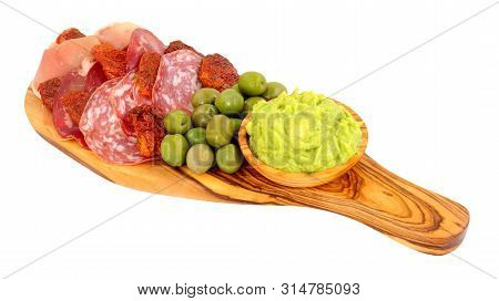 Gran Antipasto Snack Selection On An Olive Wood Serving Board With Salami, Cured Meat Slices And A B