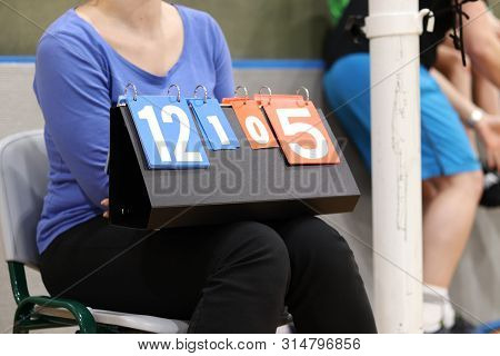 Succesful Women Ended After Hard Job And Afternoon She Goes Works As Scorekeeper. Plastic Abacus Wit