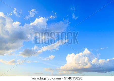 Winter Blue Sky Background And White Clouds In Sunny Day Before Sunset With Skyspace