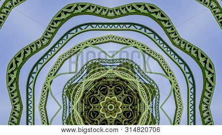 Panorama Circular Green Metal Bars Design Created Using Reflections In A Rounded Shape From A Bridge