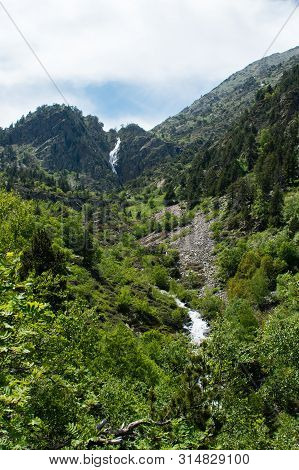 Landscape With Waterfall In The Mountains In Summer At Parc Natural Del Comapedrosa, Arinsal, Andorr