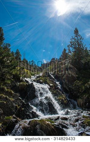 Landscape With Waterfall In The Mountains In Summer At Parc Natural Del Comapedrosa, Arinsal, Andorr