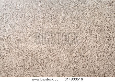Wool Carpet Texture. Light Brown Fabric Flooring.