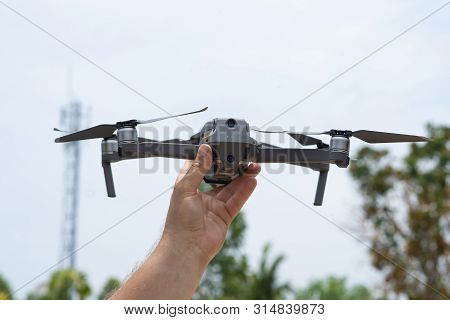 Female Hand Launches Drone For Flight, With Which You Can Take Photos And Video Filming, Close-up.