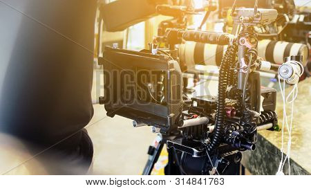 Film Industry. Filming With Professional Camera Background