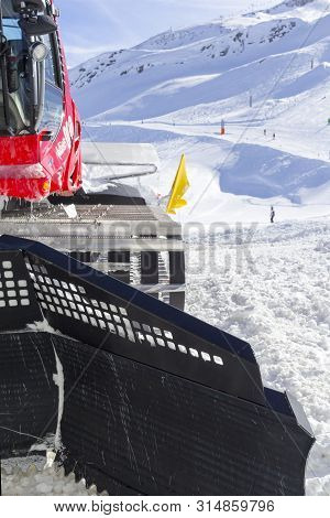 Snowplow Clears Tracks In The Ski Resort Of The Hintertuxer In Tyrol, Austria