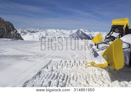 Scoop Of Snowplow Clears Tracks In The Ski Resort Of The Hintertuxer In Tyrol, Austria