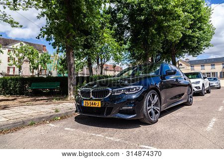 France Lyon 2019-06-20 Closeup Luxury Dark Blue German Car Sedan Premium Bmw 5 Series With Eu Regist