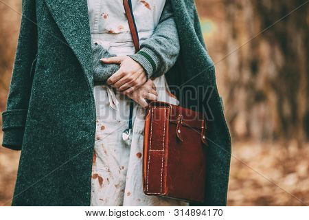 Unidentified Re-enactor Wears Historical German Nurse Paramedic Of World War 2 Uniform