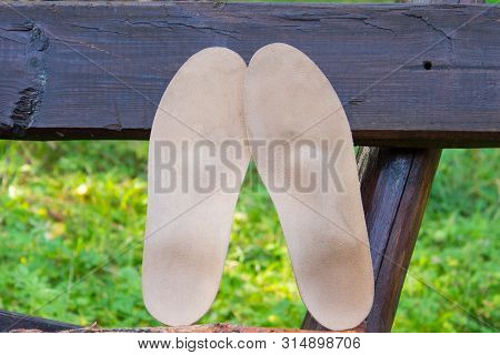 Blue Bench With Leather Orthopedic Insoles On It. Healthy Relax On Nature. Outdoors.