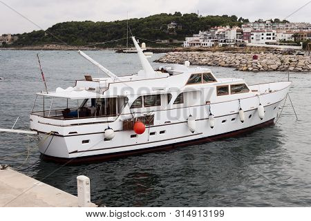 Recreational Yacht  Moored In The Pier In Roc De Sant Gaieta, Tarragona, Spain.