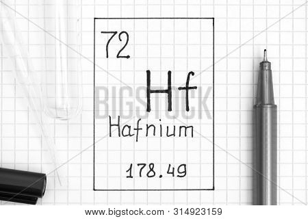 The Periodic Table Of Elements. Handwriting Chemical Element Hafnium Hf With Black Pen, Test Tube An