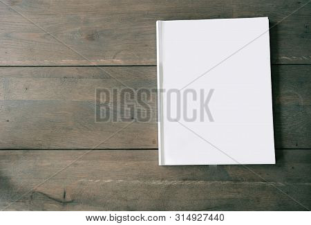 Blank Magazine Or Brochure On Wooden Background Texture, Top View And Space For Text Emplate For You