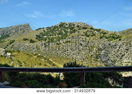 Coastal Road Winding Through To Lighthouse Cap Formentor