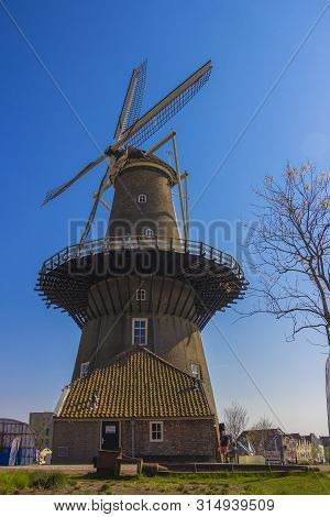 Leiden, Holland, Netherlands, April 21, 2019.  Street View, Molen De Valk Museum (falcon Windmill) T