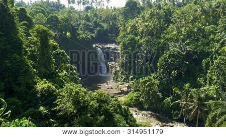 Wide Morning Shot Of Tegenungan Waterfall On The Island Of Bali
