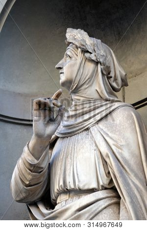 FLORENCE, ITALY - JANUARY 11, 2019: Francesco Petrarca statue in the Niches of the Uffizi Colonnade in Florence, Italy