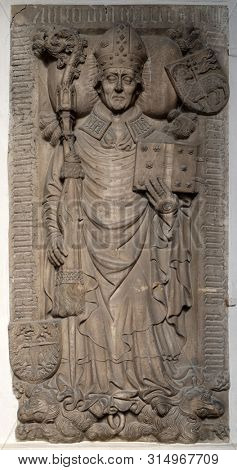 BRESSANONE, ITALY - JULY 14, 2018: A memorial tablet on the portal of the Cathedral of Santa Maria Assunta i San Cassiano in Bressanone, Italy